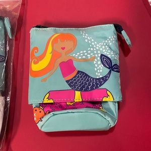 NWT HIDE AND PEEK POUCH